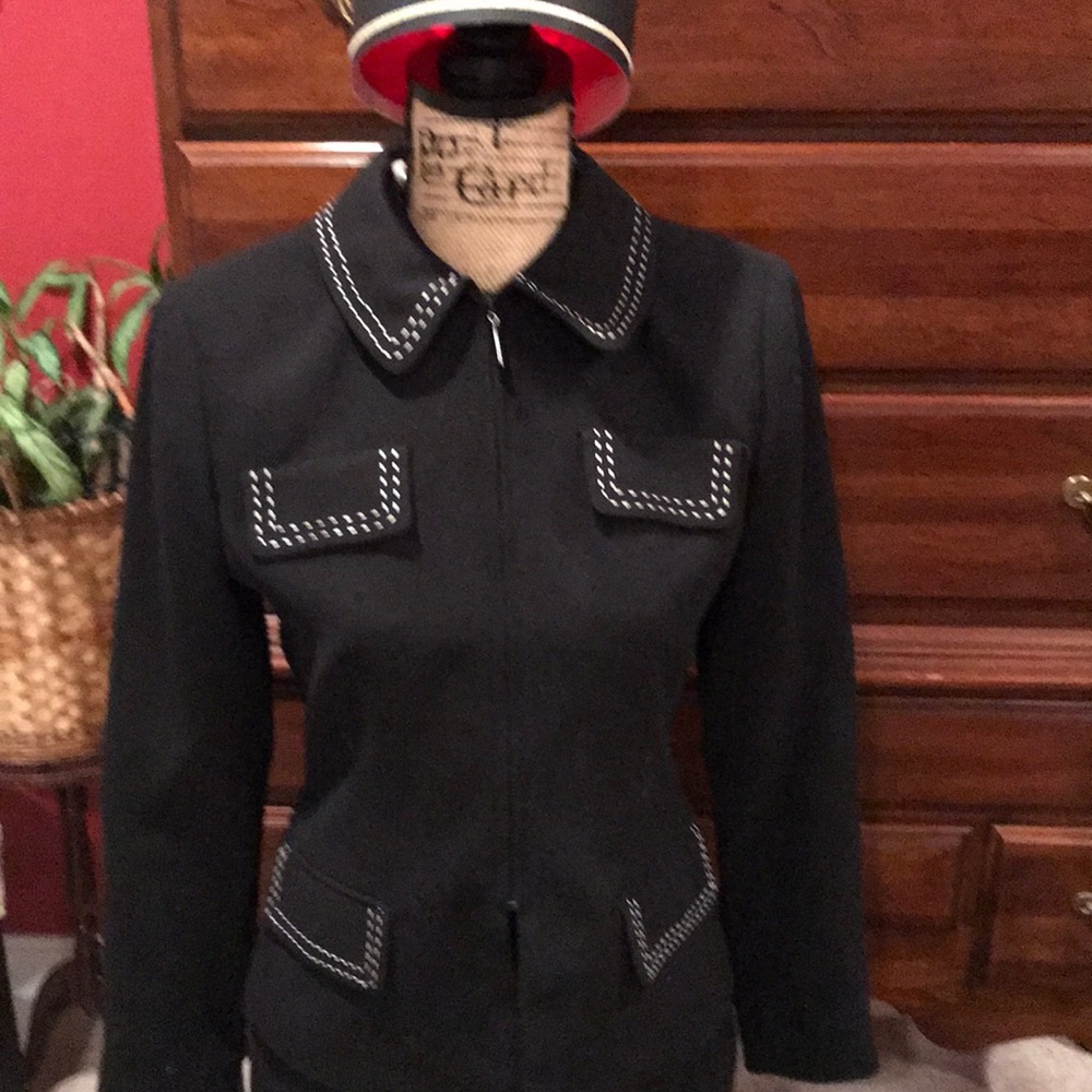 Ladies Two piece black suit with white piping.